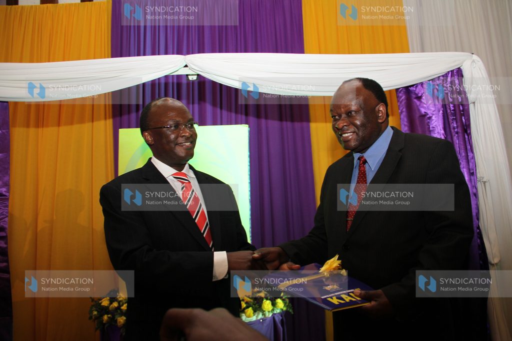 Cabinet secretary Health James Macharia with Dr. George Kichamu