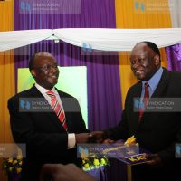 Cabinet secretary Health James Macharia with Dr. George Kichamu
