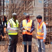 Construction Eng. John Mwatu, Cabinet Secretary Ministry of Transport, Infrastructure, Housing and Urban Development James Macharia and China Wu Yi project manager Liu Qing Hua