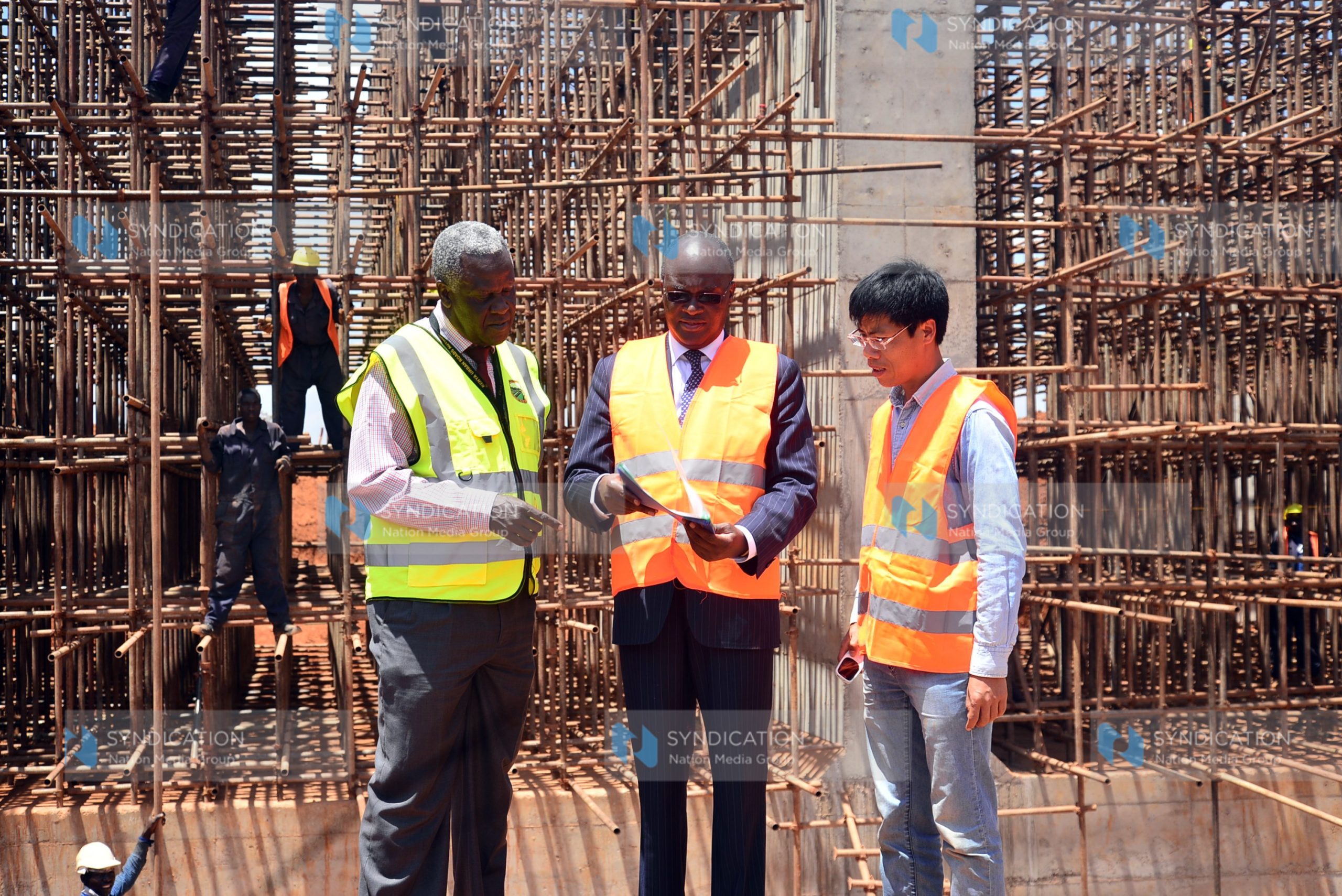 Construction Eng. John Mwatu, Cabinet Secretary Ministry of Transport, Infrastructure, Housing and Urban Development James Macharia and China Wu Yi project manager Liu Qing Hua