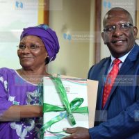Environment Cabinet Secretary Keriako Tobiko with Chair of the Task Force on Environment Management Marion Wakanyi Kamau