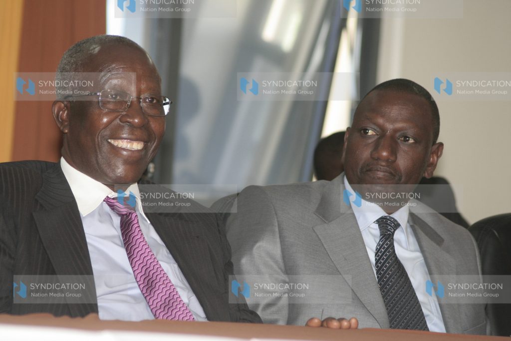 Education Minister, Prof Sam Ongeri and Higher Education Minister, William Ruto follow proceedings