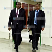 Kenya National Examination Council (KNEC) CEO Dr. David Njengere and Ministry of Education Cabinet Secretary Julius Migos Ogamba