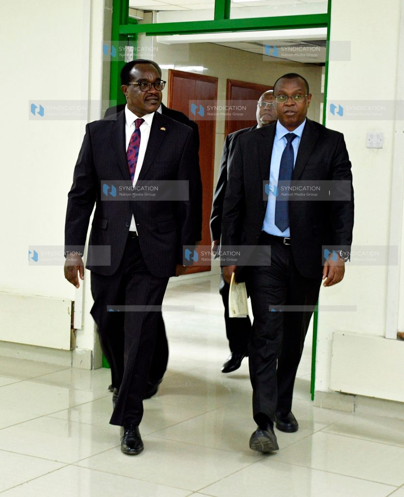 Kenya National Examination Council (KNEC) CEO Dr. David Njengere and Ministry of Education Cabinet Secretary Julius Migos Ogamba