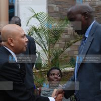 Interior Cabinet Secretary Joseph Ole Lenku greets RMA motors CEO Sanjiv Shah
