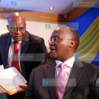 Health cabinet secretary James Macharia and Kenya medical practitioners and dentists board CEO Daniel Yumbia