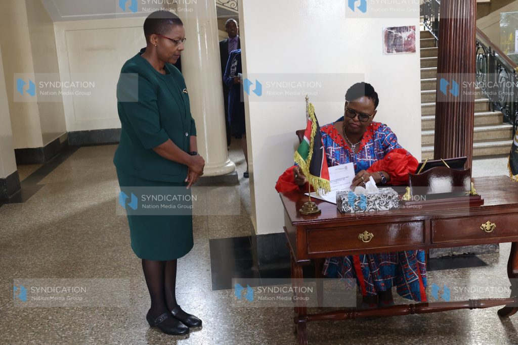 Chief Justice Martha Koome appends signature on documents