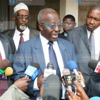 Education Minister Professor Sam Ongeri (centre) address the press