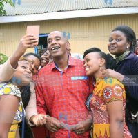 Kiambu Senator Kimani Wamatangi takes a selfie with youth from Mangu in Gatundu North
