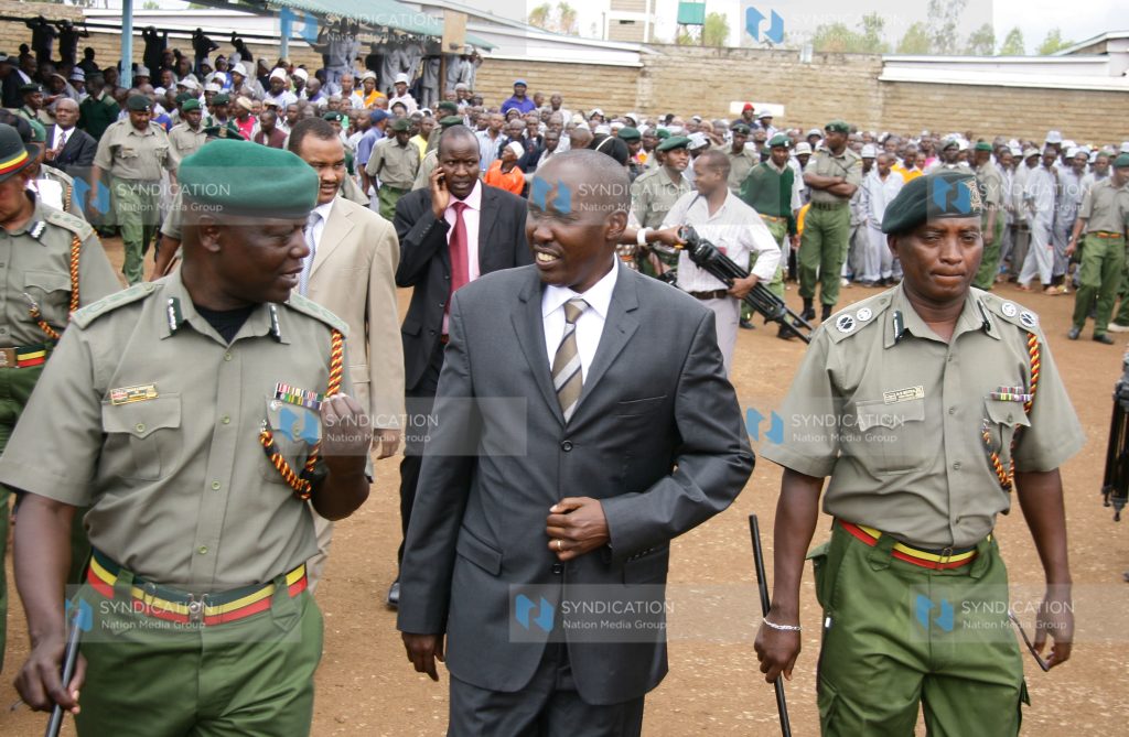 Prisons Commissioner General Isaiah Osugo with College Commandant Daniel Mutua takes Interior Cabinet Secretary Joseph Ole Lenku around Kamiti Maximum Prisons