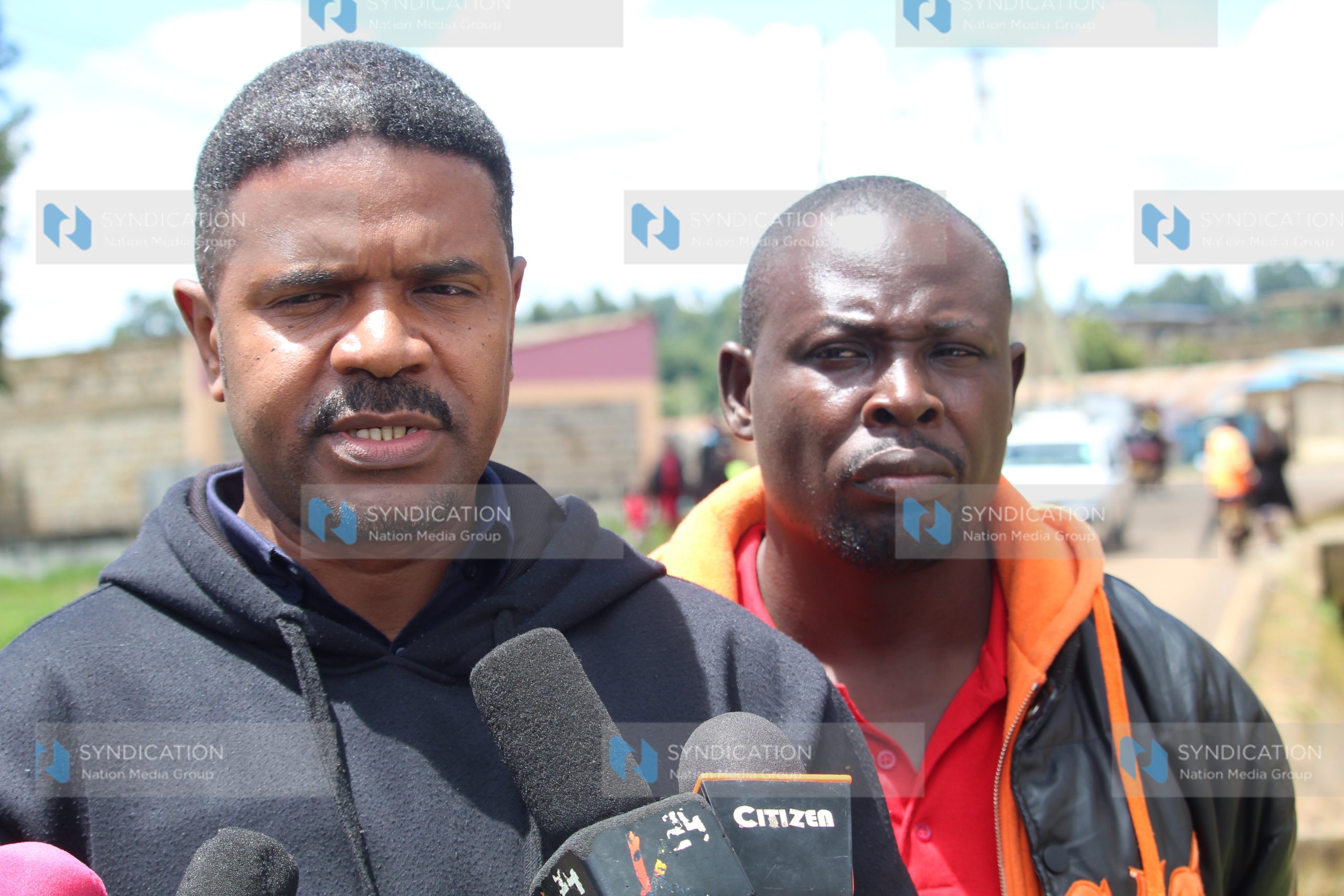 Mr. Hussein Khalid (left) and Mr. Fredrick Odhiambo