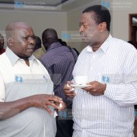 Musalia Mudavadi confers with Mark Too (left) during the Amani Coalition retreat