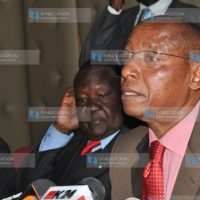 KNUT Secretary General David Okuta with Education Minister Mutula Kilonzo