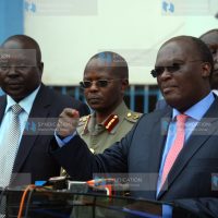 James Macharia (right), Inspector General of Police Joseph Boinett (centre) and David Too from Ethics and Anti-Corruption Commission addressing Journalists