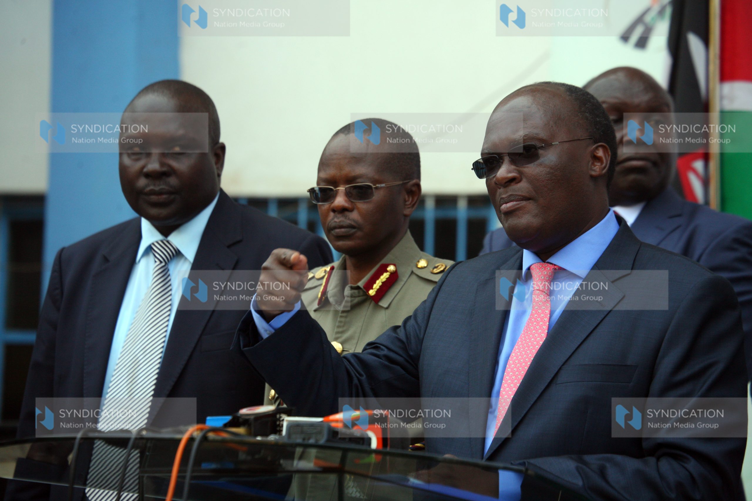 James Macharia (right), Inspector General of Police Joseph Boinett (centre) and David Too from Ethics and Anti-Corruption Commission addressing Journalists