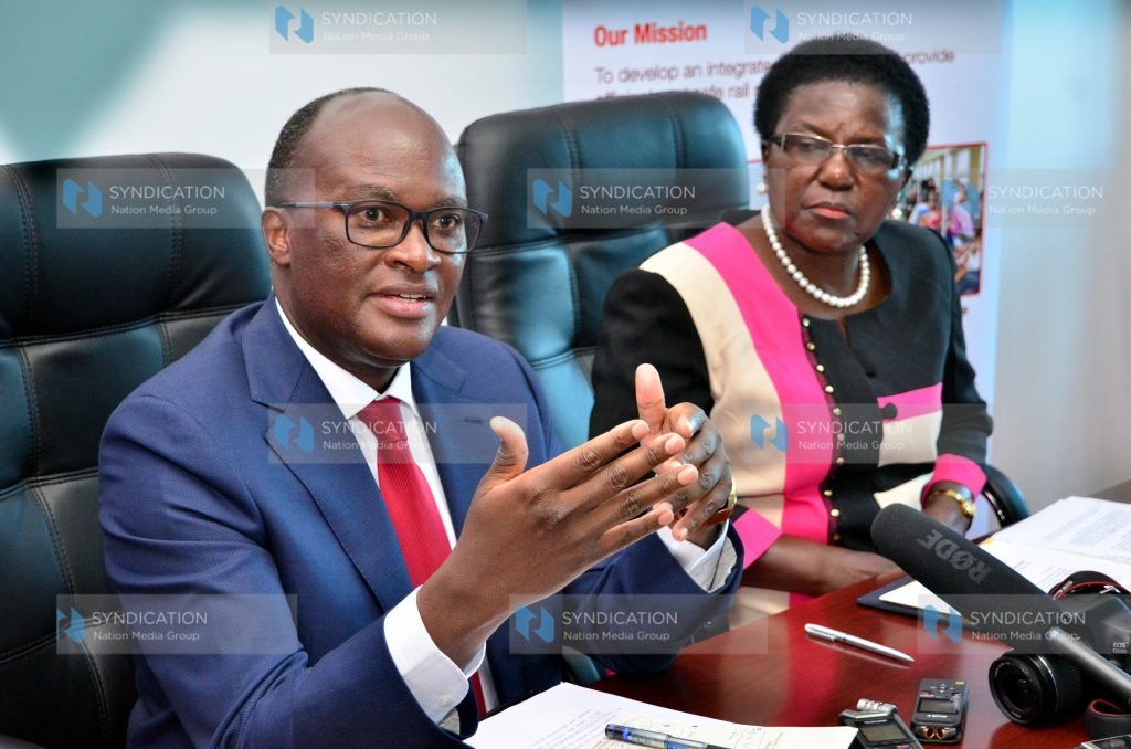 James Macharia (left) gestures while addressing a delegation