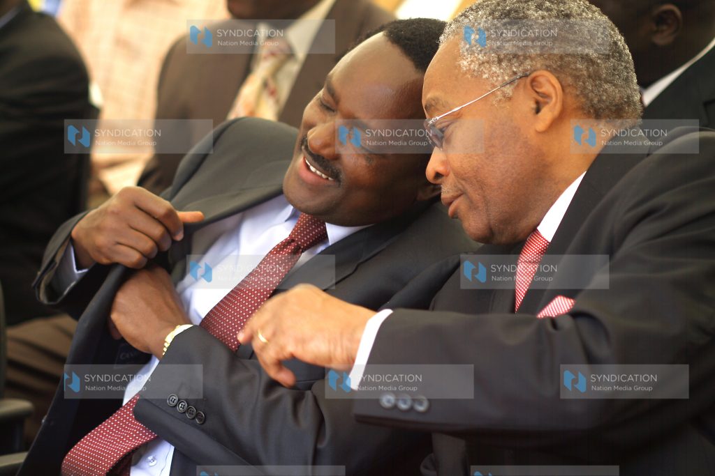 The Vice president Kalonzo Musyoka has a word with the Minister for Trade Chirau Ali Makwere