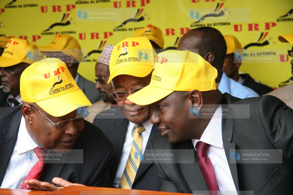 URP party leader William Ruto chats with the Party chairman Francis Ole Kaparo, and member of URP Chirau Ali Makwere
