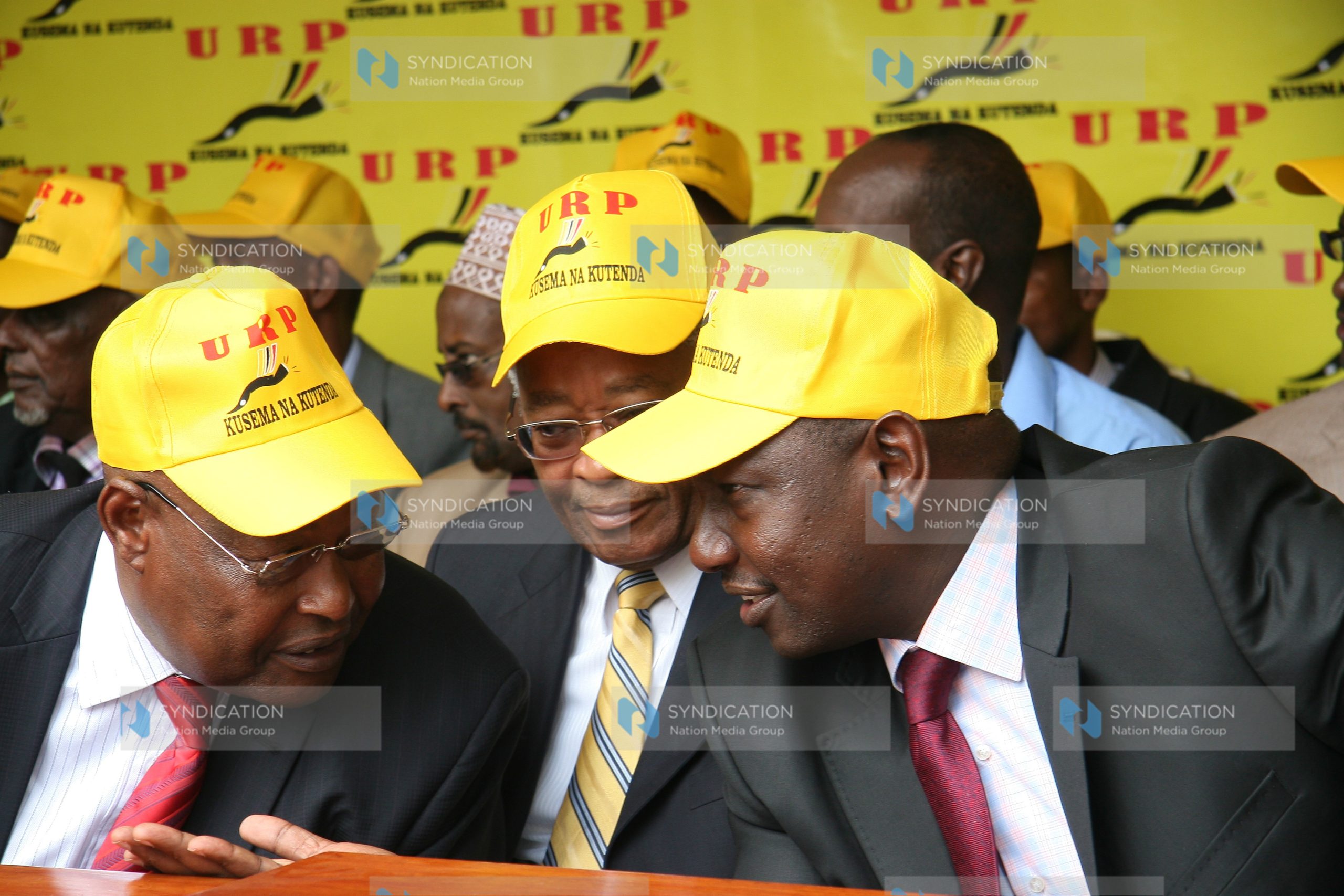 URP party leader William Ruto chats with the Party chairman Francis Ole Kaparo, and member of URP Chirau Ali Makwere