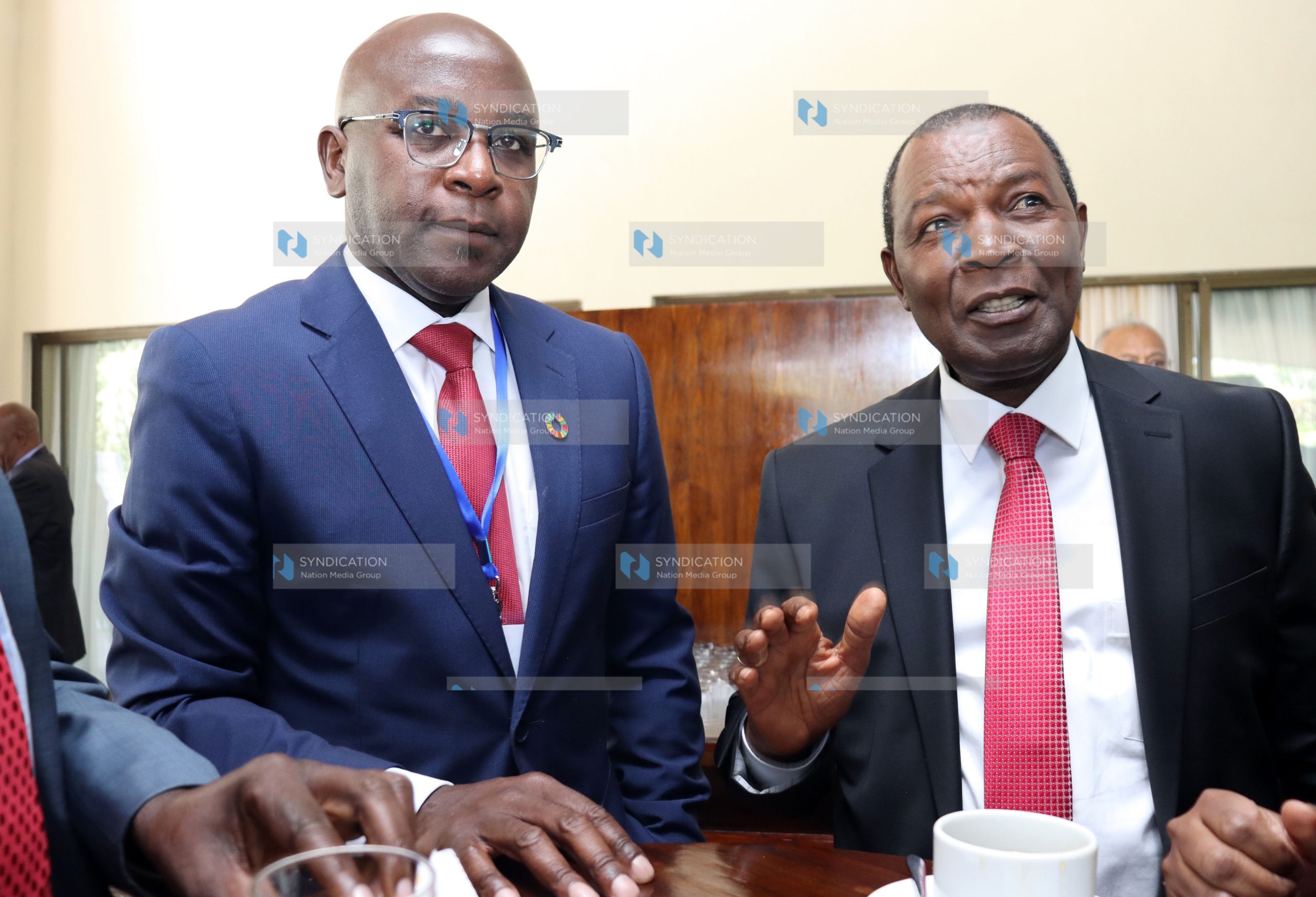 Kenya Revenue Authority (KRA) Commissioner General Humphrey Mulongo with Cabinet Secretary for National Treasury and Economic Planning Prof. Njuguna Ndung’u