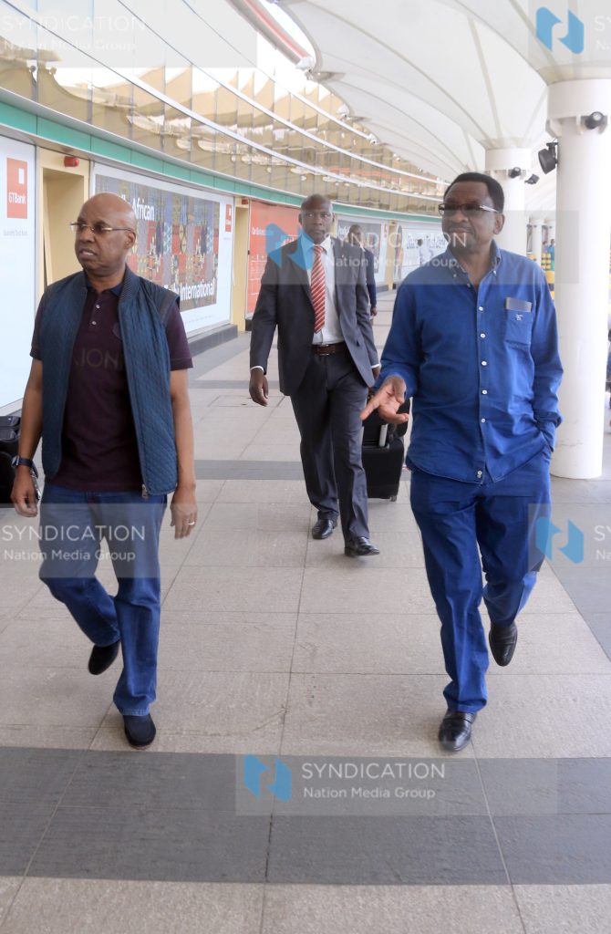 Senator James Orengo (right) with businessman Jimi Wanjigi arrives at Jomo Kenyatta International Airport
