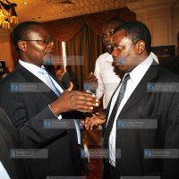 Sports Minister Paul Otuoma exchange views with Cecafa General Secretary Nicholas Musonye