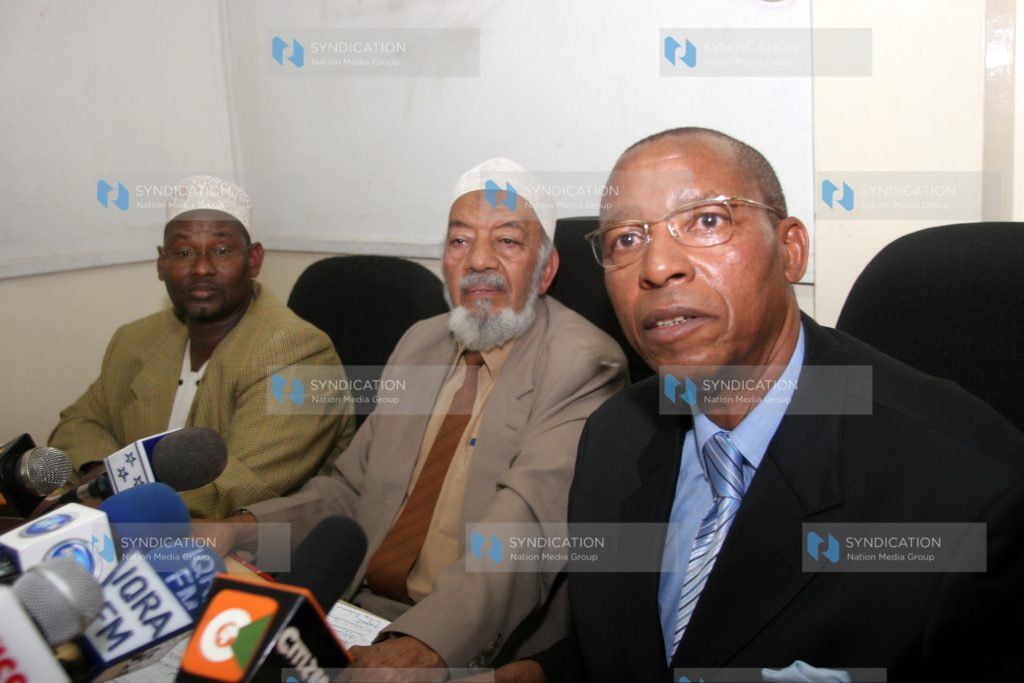Minister for Justice and Constitutional Affairs Mutula Kilonzo with Supkem Chairman Abdul-Ghafur El-Busaidy and the council Secretary General Adan Wachu