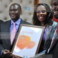 Health cabinet secretary James Macharia (left) with Micro Clinic Technology founder Mary Matu