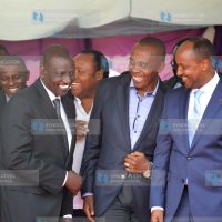 Deputy President William Ruto shares a word with Kiambu Senator Kimani Wamatangi and Githunguri MP Kago wa Lydia