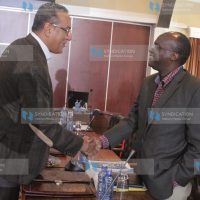 Najib Balala, left, greets his health counterpart James Macharia