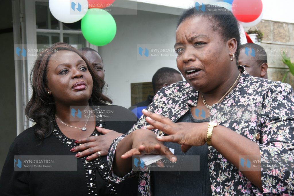 The cabinet secretary for defence Raychelle Omamo flanked by the principal secretary Monica Juma
