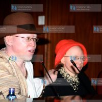 Albinism Society of Kenya National Coordinator Isaac Mwaura introduces his colleague Lydia Mugure
