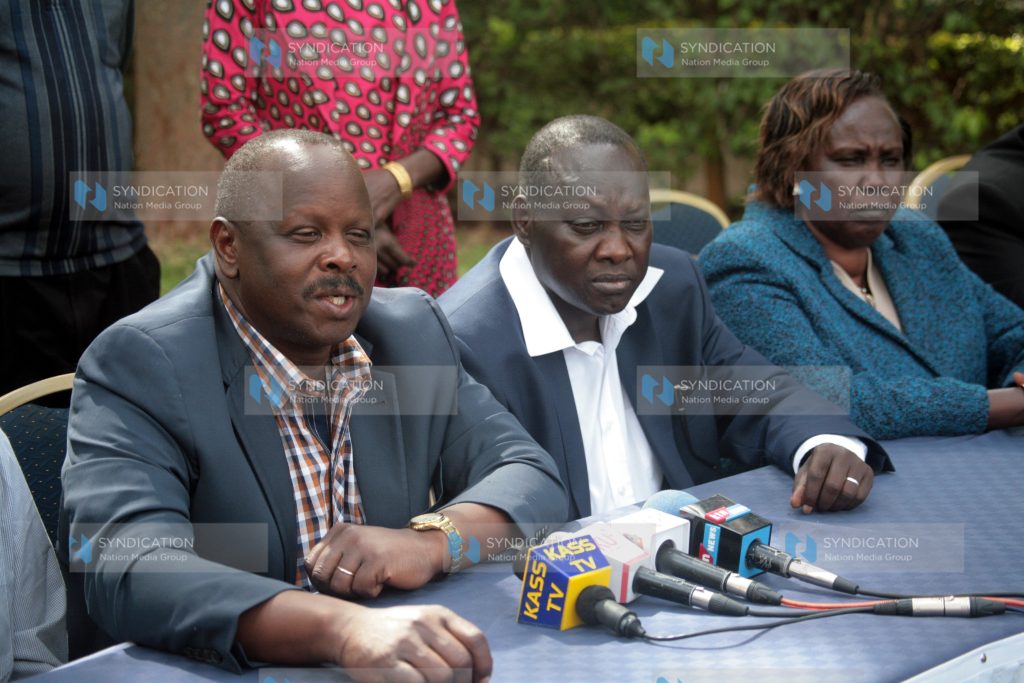Chama Cha Mashinani leader Isaac Ruto (left) addresses journalists