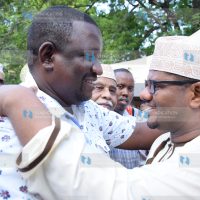 Kwale Governor Salim Mvurya (left) consoles Former Mombasa Senator Hassan Omar (right)