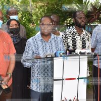 Council of Governors Chairman Martin Wambora (C), flanked by members of the Health Committee