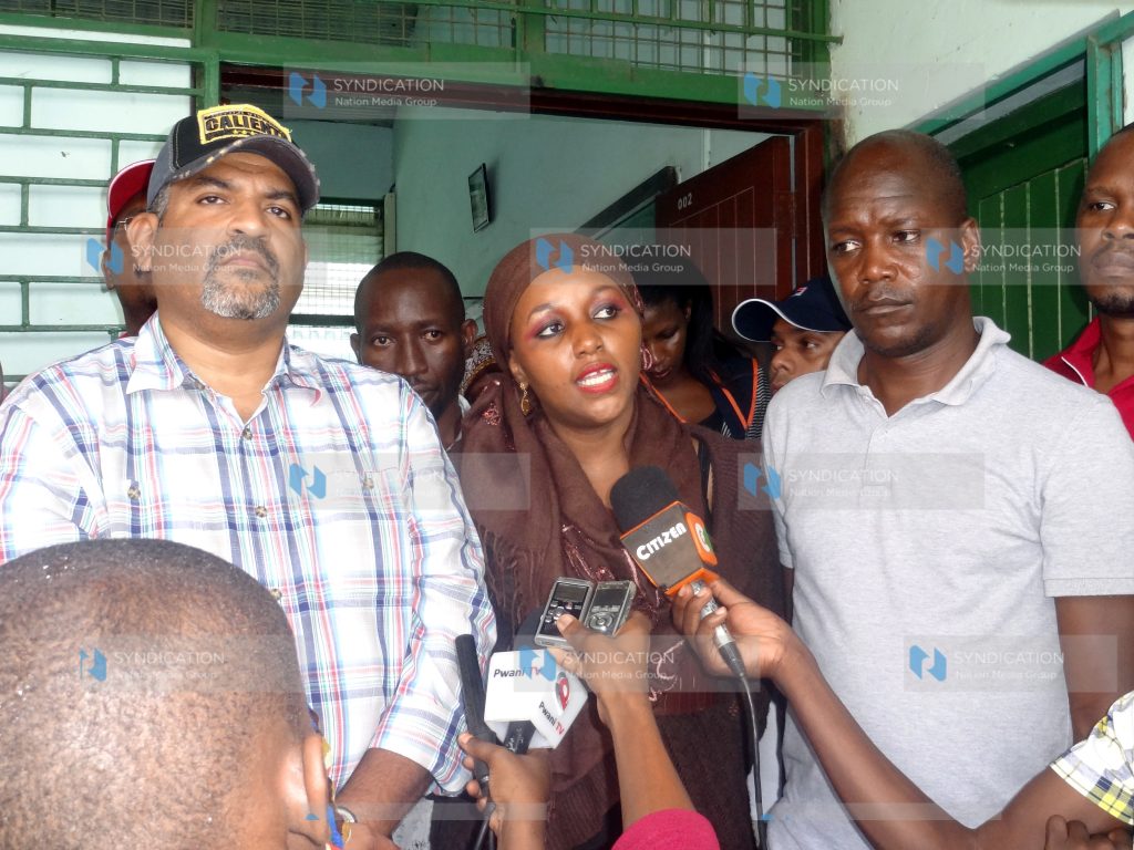 MP Abdulswamad Nassir and County Executive for Lands, Planning and Housing Francis Thoya address a press conference