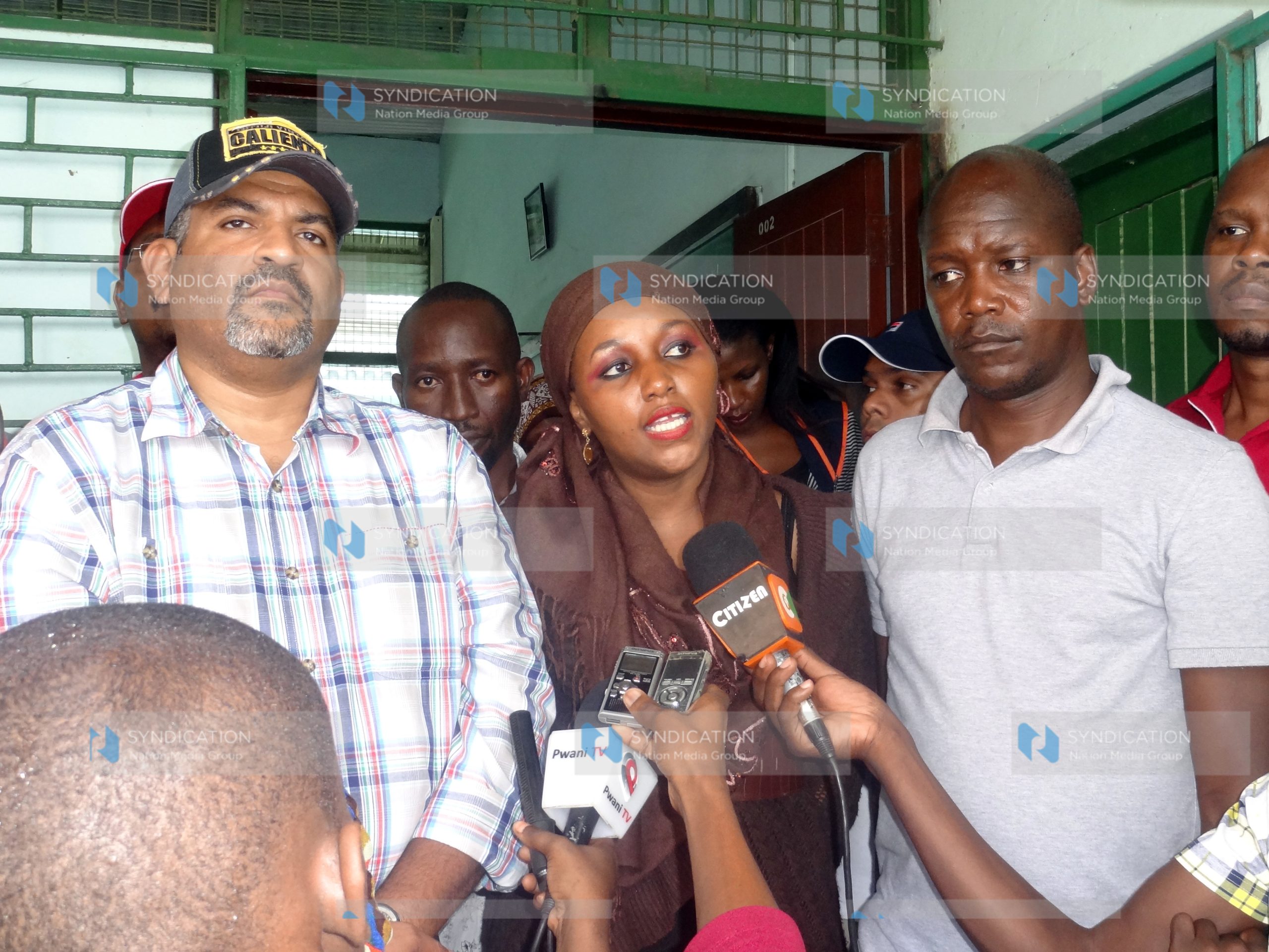 MP Abdulswamad Nassir and County Executive for Lands, Planning and Housing Francis Thoya address a press conference