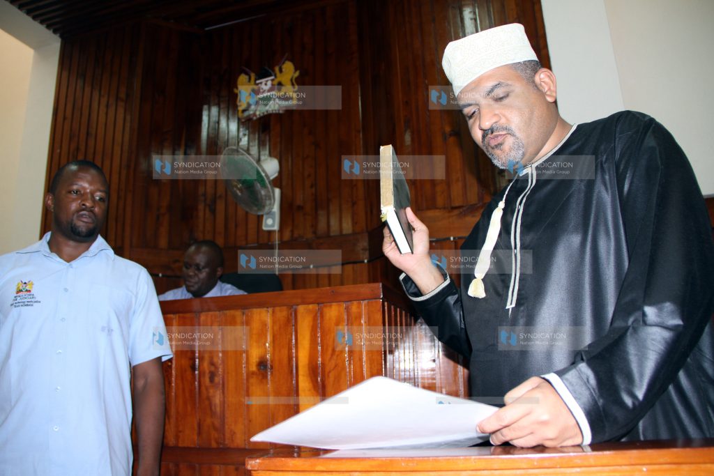 Mvita MP Abdulswamad Nassir swears on the Quran while in the witness box
