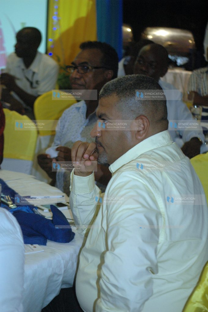 Mvita MP Abdulswamad Nassir follows speeches by Kenya manufacturers