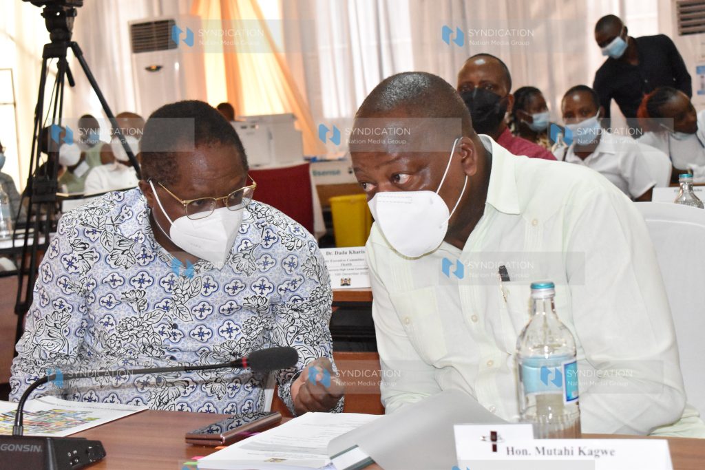 Council of Governors Chairman Martin Wambora speaks with Ministry of Health Cabinet Secretary Mutahi Kagwe