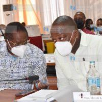 Council of Governors Chairman Martin Wambora speaks with Ministry of Health Cabinet Secretary Mutahi Kagwe