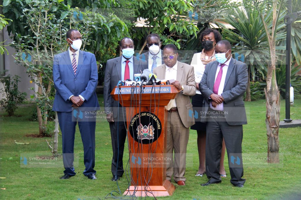 Council of Governors (CoG) Chair and Embu Governor Martin Wambora (second right) addresses a press conference