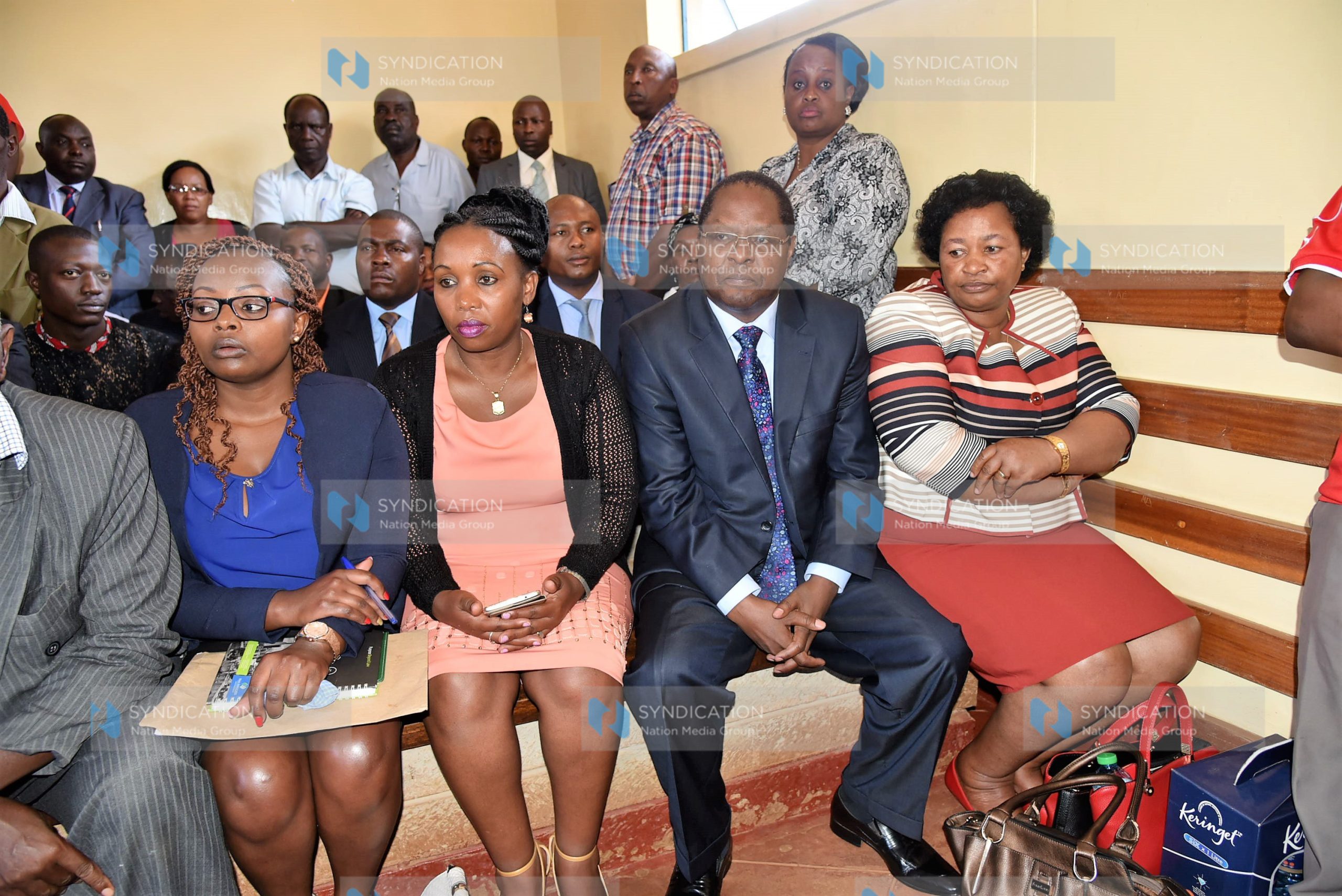 Governor Martin Wambora (second right), together with his wife Teresa (right), follows the proceedings of an election petition