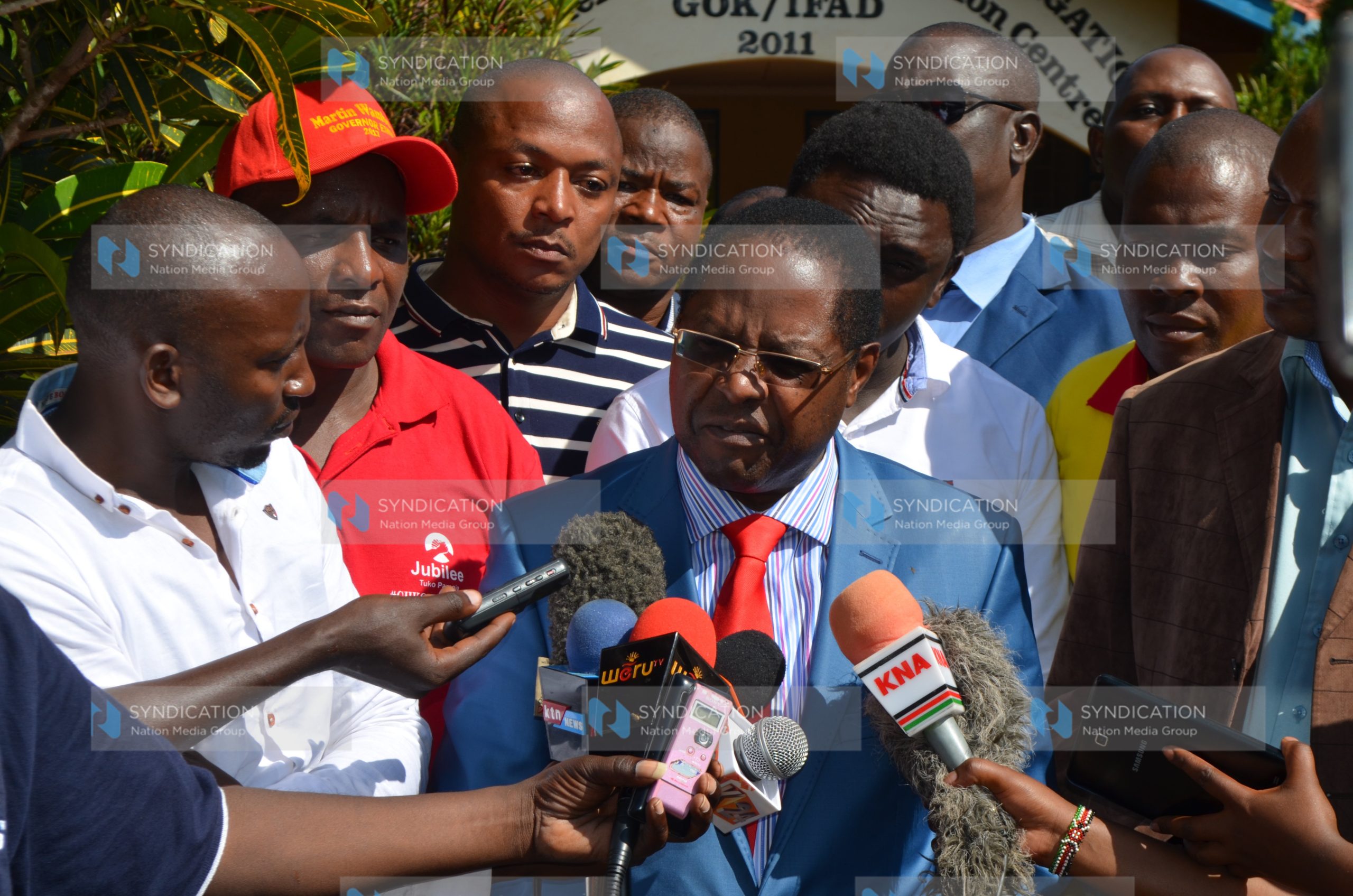 Embu Governor Martin Wambora (in a blue suit), together with his supporters, addresses the press