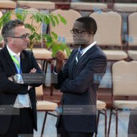Ezra Chiloba shares a word with British High Commissioner Nick Hailey