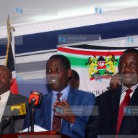 Addressing journalists at Delta House