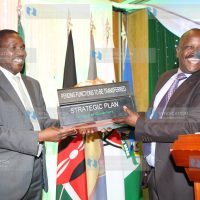 Outgoing Council of Governors (CoG) Chair Isaac Ruto and Meru Governor Peter Munya