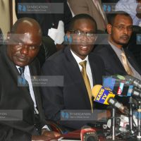 IEBC Chairman Wafula Chebukati, his Chief Executive Officer Ezra Chiloba and Commissioner Yakub Guliye