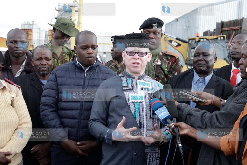 Government Spokesperson Isaac Mwaura, accompanied by other leaders