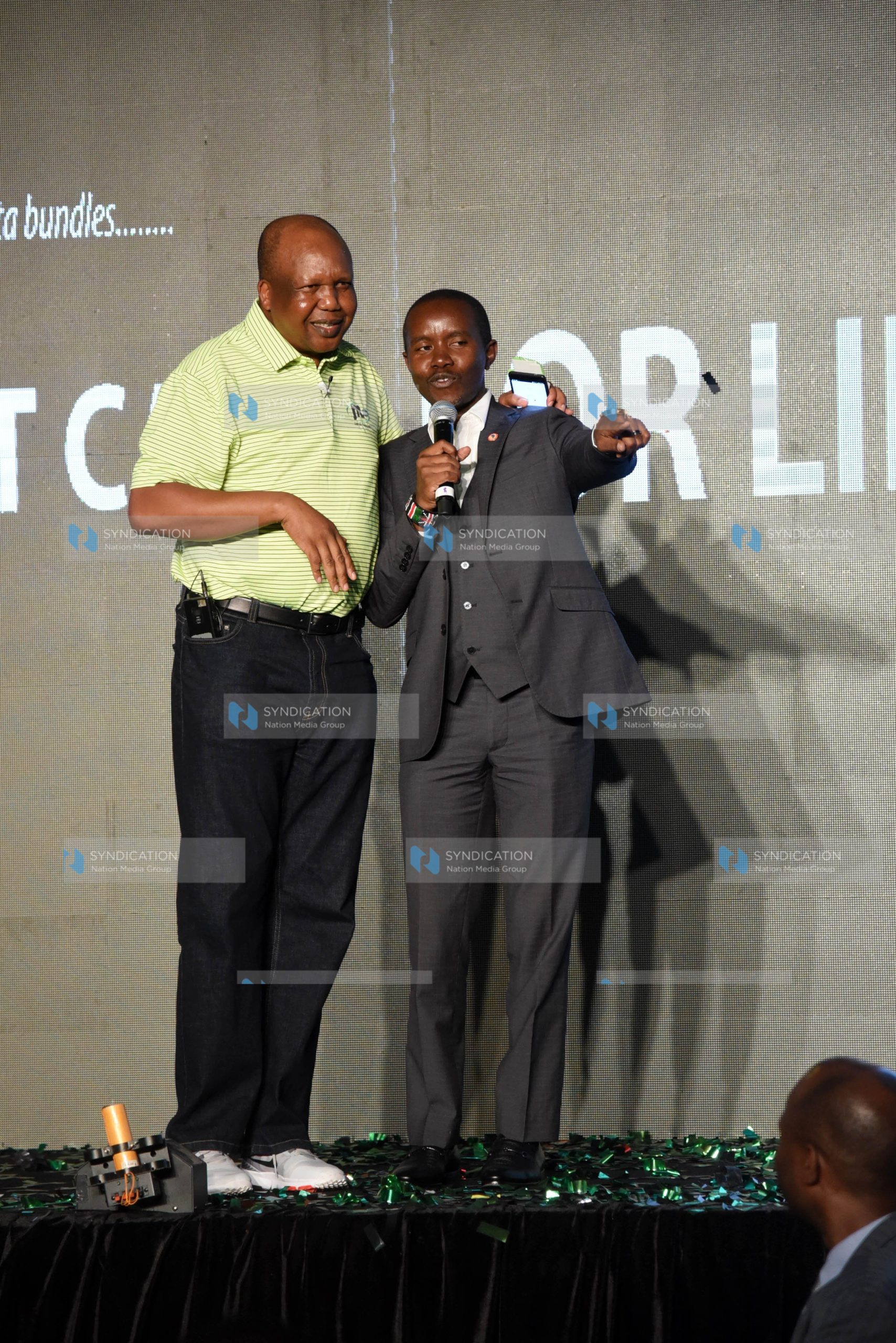 Jamii Telcom limited Chairman Joshua Chepkwony with ICT Cabinet Secretary Joe Mucheru